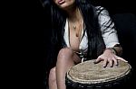 Cleavage And Djembe Stock Photo
