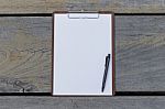 Clipboard And Blank White Paper Stock Photo