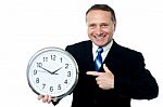 Clock Is In Business Man Hands Stock Photo