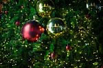 Close Up Big Red Glitter Ball Christmas On Tree With Wire White Light Background Stock Photo