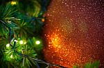 Close Up Big Red Glitter Ball Christmas On Tree With Wire White Light Background Stock Photo