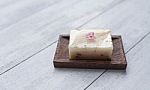 Close Up Natural Soap Bar On Wooden Soap Dish Stock Photo