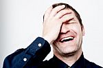 Close Up Portrait Of Hard Laughing Man Stock Photo