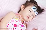 Close Up Sick Little Asian Girl With Mercury Thermometer Stock Photo