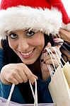 Close View Of Happy Christmas Woman Carrying Shopping Bags Stock Photo