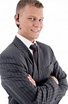Close View Of Young Executive With Blue Tooth Stock Photo