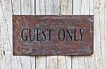 Closeup Guest Only Sign On Wooden Door Stock Photo