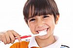 Closeup Of Cute Kid Brushing His Teeth Stock Photo