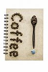 Coffee Bean Arrange In Coffee Word With Spoon And Small Cup Stock Photo
