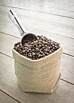 Coffee Beans In Sack Stock Photo