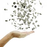 Coins Falling Down To The Business's Hand Stock Photo