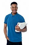 College Student Holding Notebooks Stock Photo