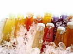 Color Bottles In Ice Stock Photo
