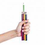 Colored Pencils In A Female Hand On A White Background  Stock Photo