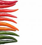 Colorful Chillies Border Isolated On White Background. These Chi Stock Photo
