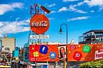 Colorful Commercial Sign Above The Street In San Jose, Costa Ric Stock Photo