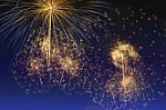 Colorful Fireworks Celebration And The Twilight Sky Background Stock Photo