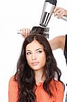 Combing And Drying The Hair Stock Photo