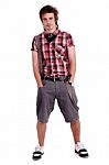 Cool Young Guy With Hands In His Pockets Stock Photo