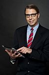 Corporate Male Using Tablet Pc Stock Photo