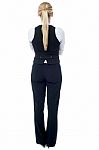 Corporate Woman Facing Towards The Wall Stock Photo
