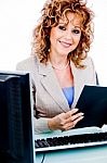 Corporate Woman Looking At File Stock Photo