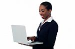 Corporate Woman Working On Laptop Stock Photo