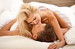 Couple Making Love In Bed Stock Photo