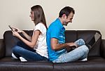 Couple Surfing The Internet Stock Photo