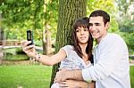 Couple Taking Picture Of Themselves Stock Photo
