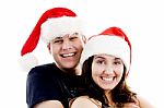 Couple Wearing Christmas Hat Stock Photo