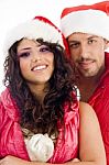 Couple Wearing Christmas Hat Stock Photo