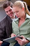 Couple With Digital Tablet Stock Photo