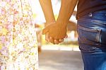 Couples Holding Hands Stock Photo