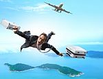 Crazy Business Man Flying From Passenger Plane With Briefcase An Stock Photo
