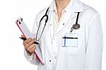 Cropped Image Of Medical Expert Holding Clipboard Stock Photo