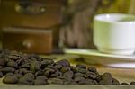 Cup Of Coffee, Coffee-beans, Coffee Grinder, Coffee Sack	 Stock Photo