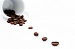 Cup With Coffe Beans On White Background Stock Photo