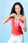 Curls Hair Woman And Bottle Of Water Stock Photo
