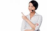 Customer Support Staff Pointing Away Stock Photo