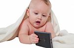 Cute Baby Boy Playing With Mobile Phone Stock Photo