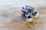 Cute Baby Shoes With The Word Love Written With The Laces Stock Photo