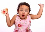 Cute Girl Surprised When Her Hotdog Is Too Hot Stock Photo