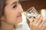 Cute Lady Drinking Pure Water Stock Photo