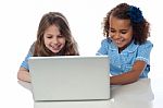 Cute Little School Girls With Laptop Stock Photo