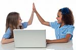 Cute Little School Girls With Laptop Stock Photo