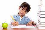 Cute Young Boy Busy In Drawing Stock Photo