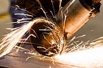 Cutting Metal By Electric Wheel Grinding Stock Photo