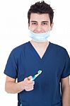 Dentist With Toothbrush Stock Photo