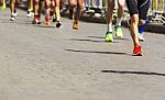 Detail Of A Group Of Runners During A City Marathon Stock Photo